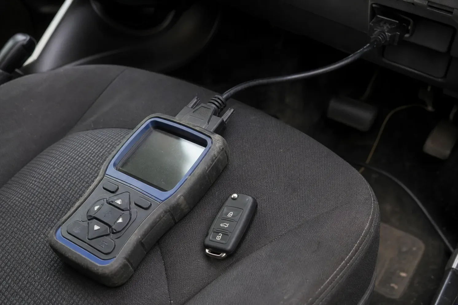 Car key programmer plugged into the OBD port, Trenton, NJ